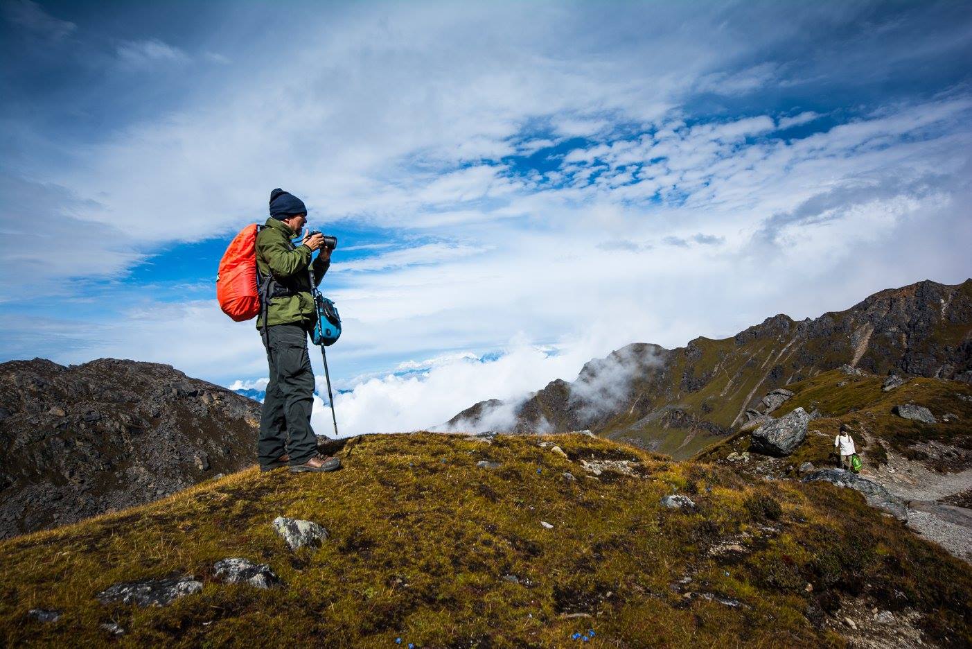 Traditional shamans performing spiritual rituals near the sacred Gosainkunda Lake in Nepal, surrounded by Himalayan peaks during the Gosainkunda Shamanism Culture Trek.
