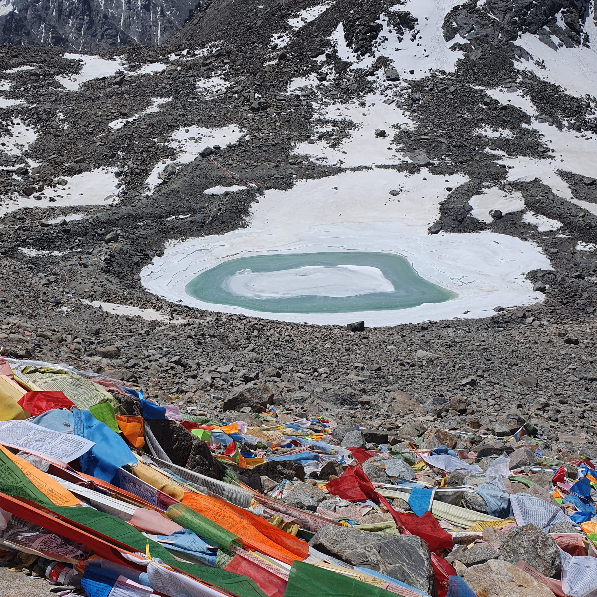 Aerial view of Mount Kailash, Lake Manasarovar, and the Himalayan landscape during the Kailash Manasarover Yatra by Helicopter to Hilsa in Tibet.