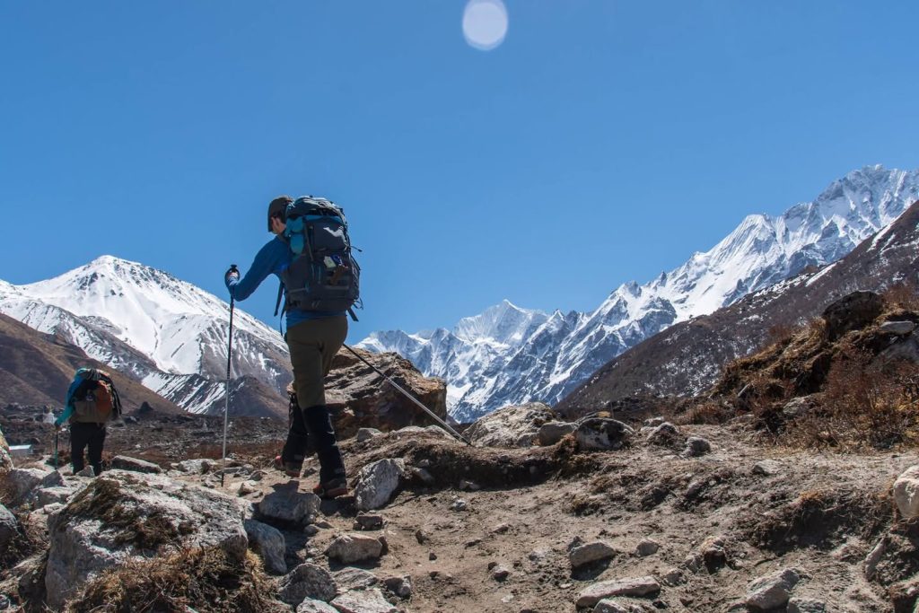 Trekkers crossing Lauribina Pass with panoramic views of Langtang and Gosaikunda regions during the 16-day Langtang Gosaikunda Lauribina Pass Trek in Nepal
