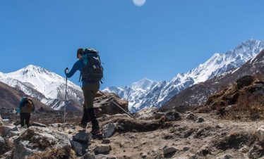 Trekkers crossing Lauribina Pass with panoramic views of Langtang and Gosaikunda regions during the 16-day Langtang Gosaikunda Lauribina Pass Trek in Nepal