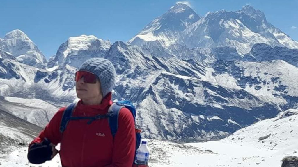 Trekkers crossing glacial trails with views of Mount Everest and Gokyo Lakes during the Renjola Gokyo Everest Base Camp Trek in Nepal.