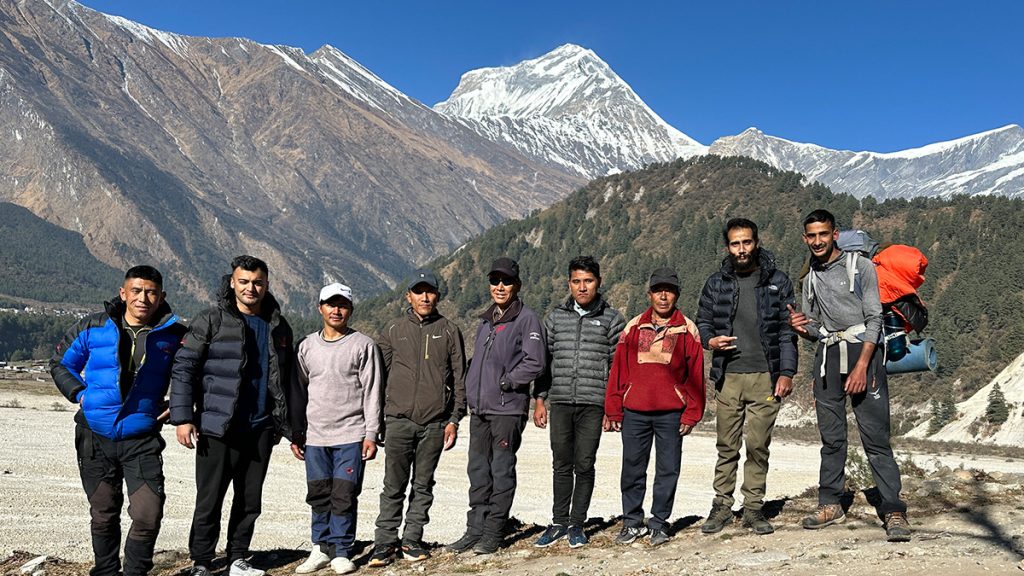 Tented camp with trekkers at Nilgiri and North Annapurna Base Camp surrounded by snow-capped peaks in Nepal during the Nilgiri and North Annapurna Base Camp Tented Trek