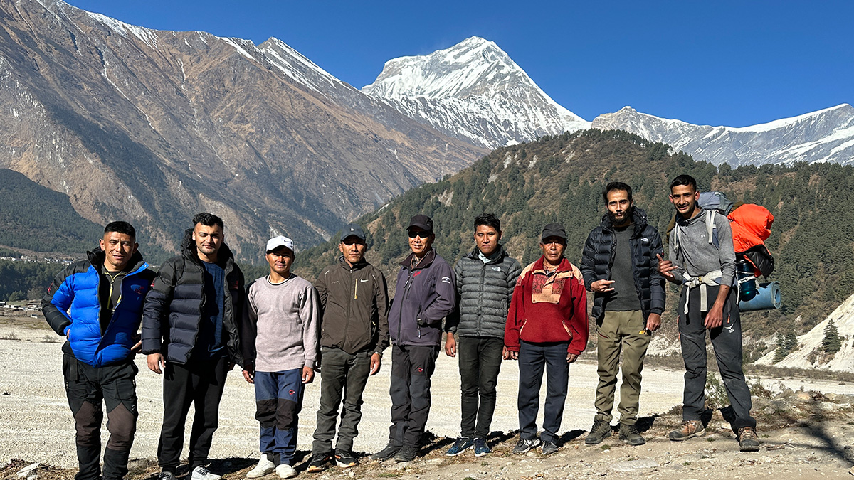 Tented camp with trekkers at Nilgiri and North Annapurna Base Camp surrounded by snow-capped peaks in Nepal during the Nilgiri and North Annapurna Base Camp Tented Trek