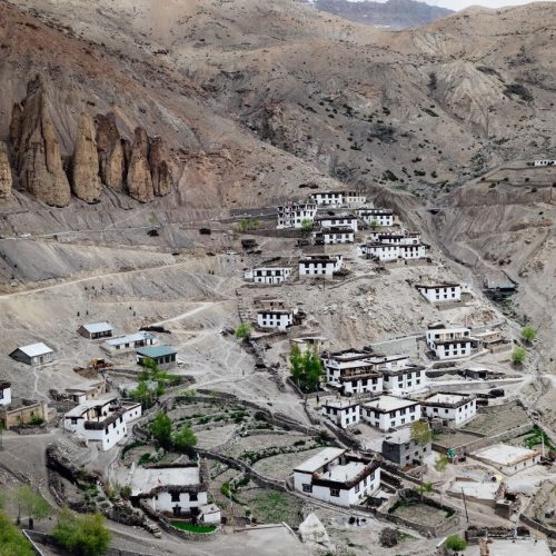 Explore the unique landscape and architecture of Dhankhar Village, nestled in the Spiti Valley.